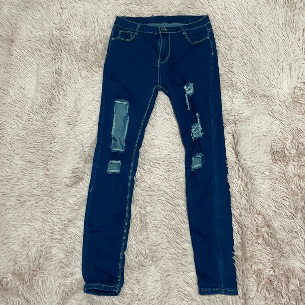 dark jeans with rips